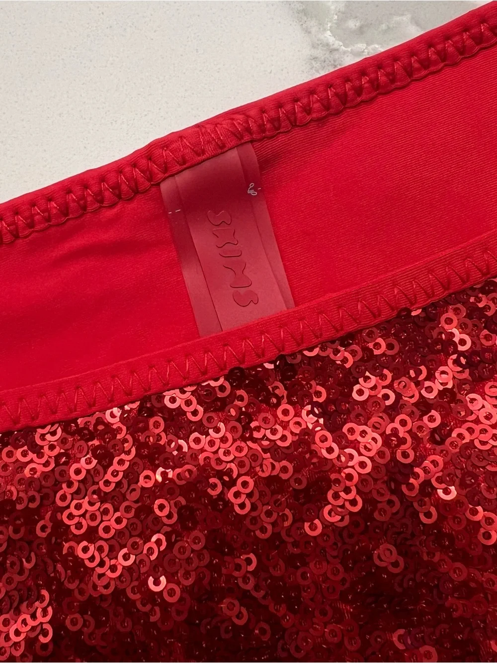 SKIMS SEQUIN BIKINI BOTTOM - Brick Size L